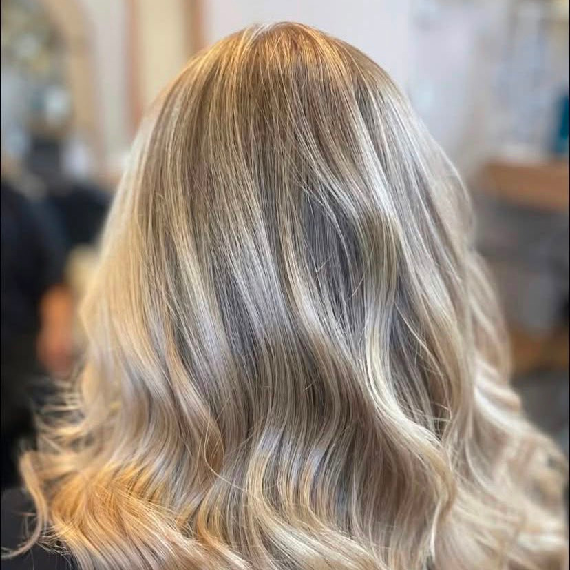 picture of lady having hair cut