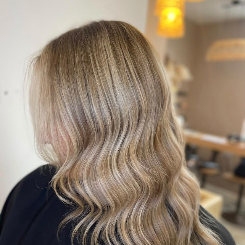 picture of lady having hair cut
