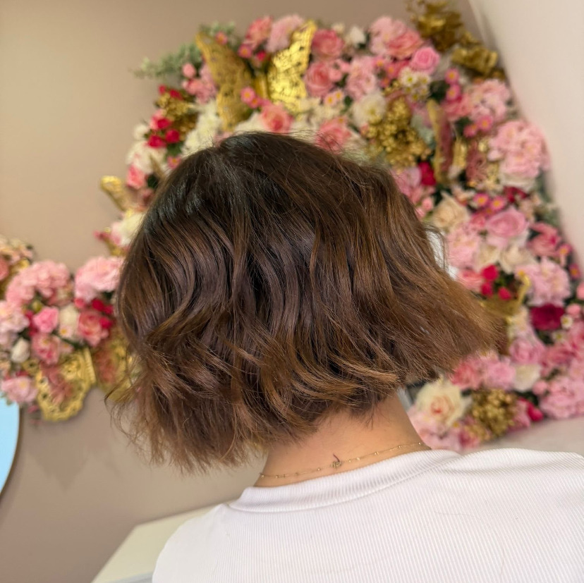 picture of lady having hair cut