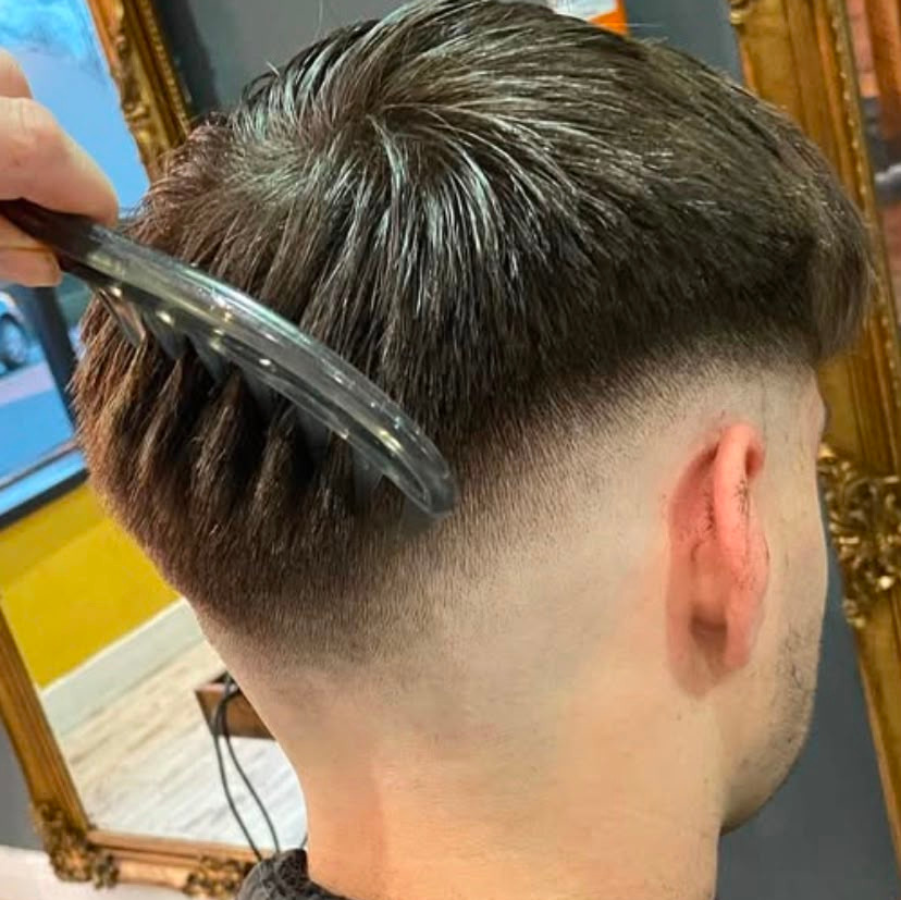picture of child having hair cut