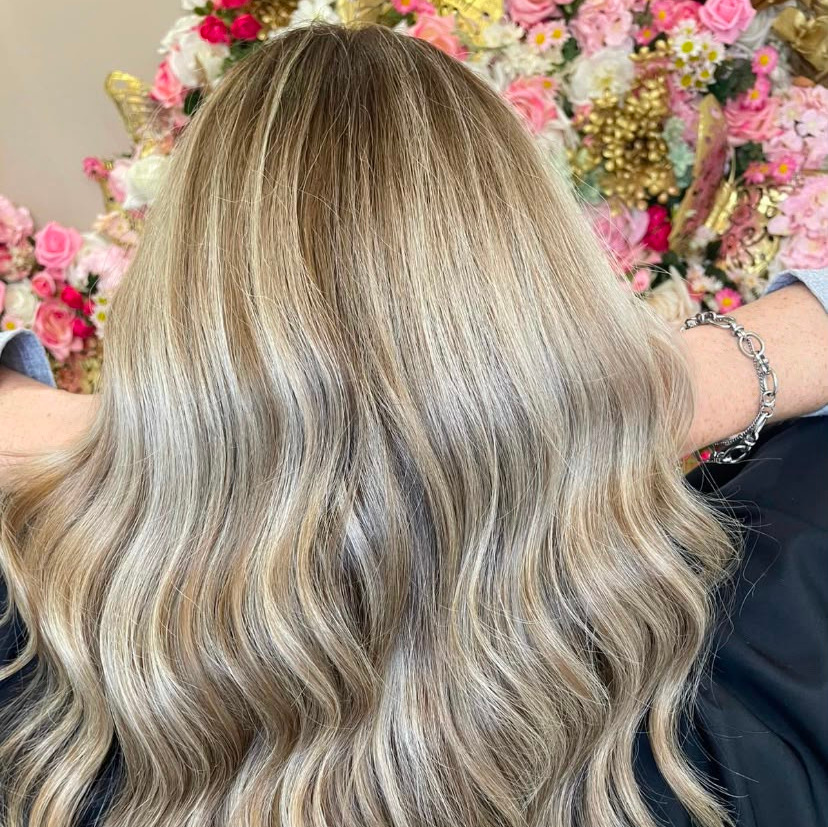 picture of lady having hair cut