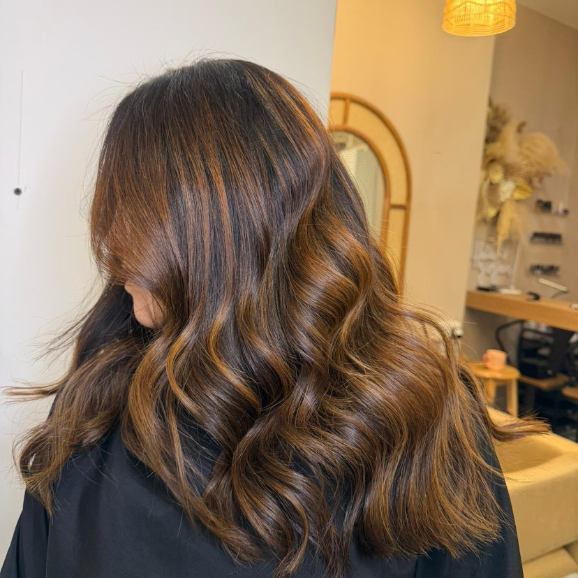 picture of lady having hair cut